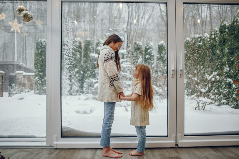 family-spending-time-at-home-in-a-christmas-decorations