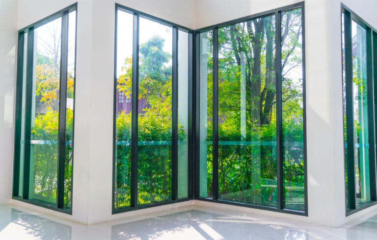 glass-window-overlooking-green-garden